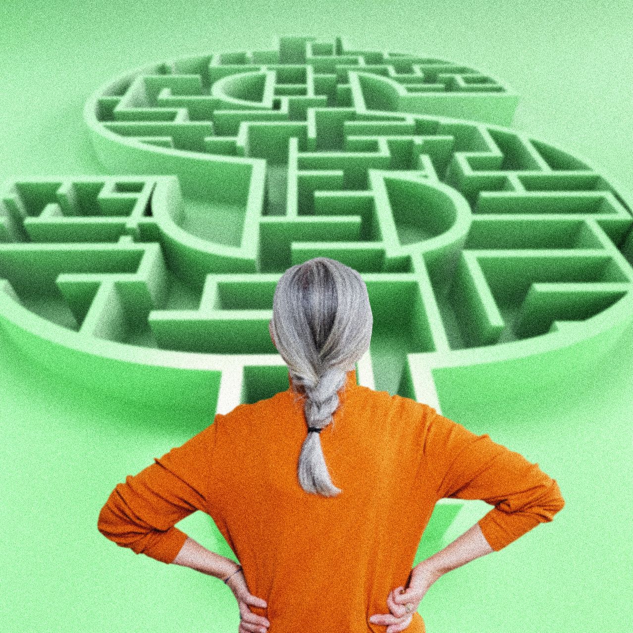 A woman looking at an image of a maze shaped like a dollar sign.
